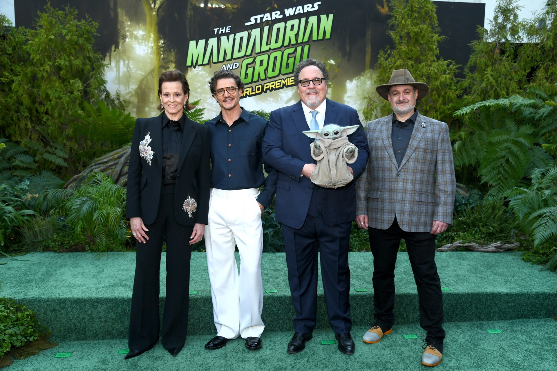 Sigourney Weaver, Pedro Pascal, Grogu, Jon Favreau, Dave Filoni at the World Premiere of Star Wars: The Mandalorian and Grogu.
