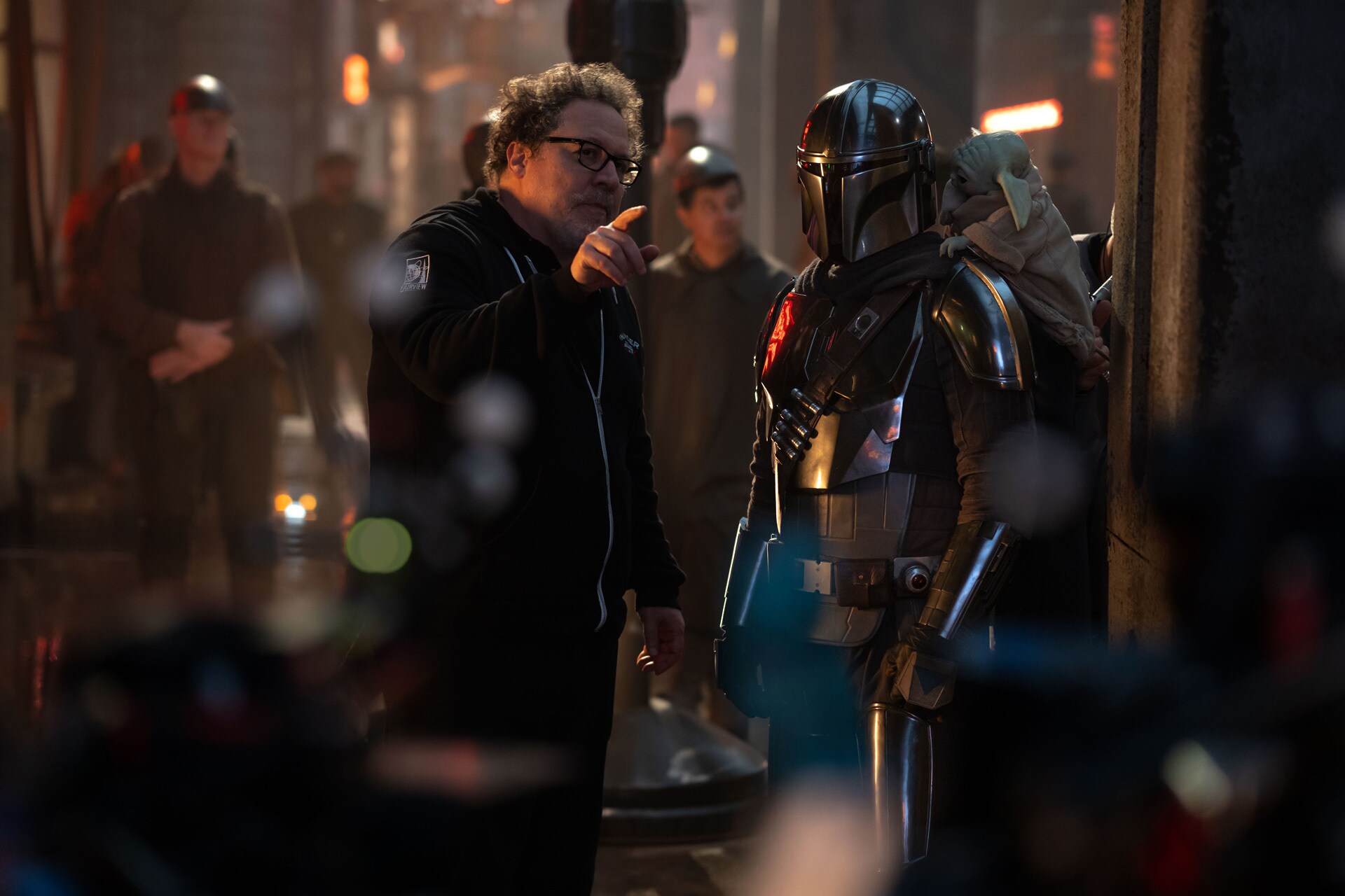 Director Jon Favreau and Pedro Pascal on the set of Star Wars: The Mandalorian and Grogu.