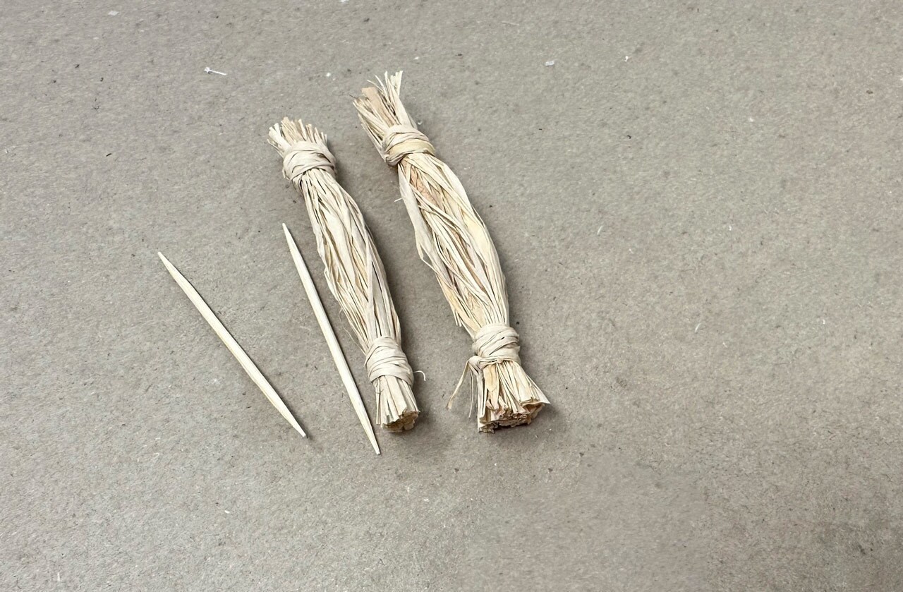Rolled straw and toothpicks for a tooka doll craft