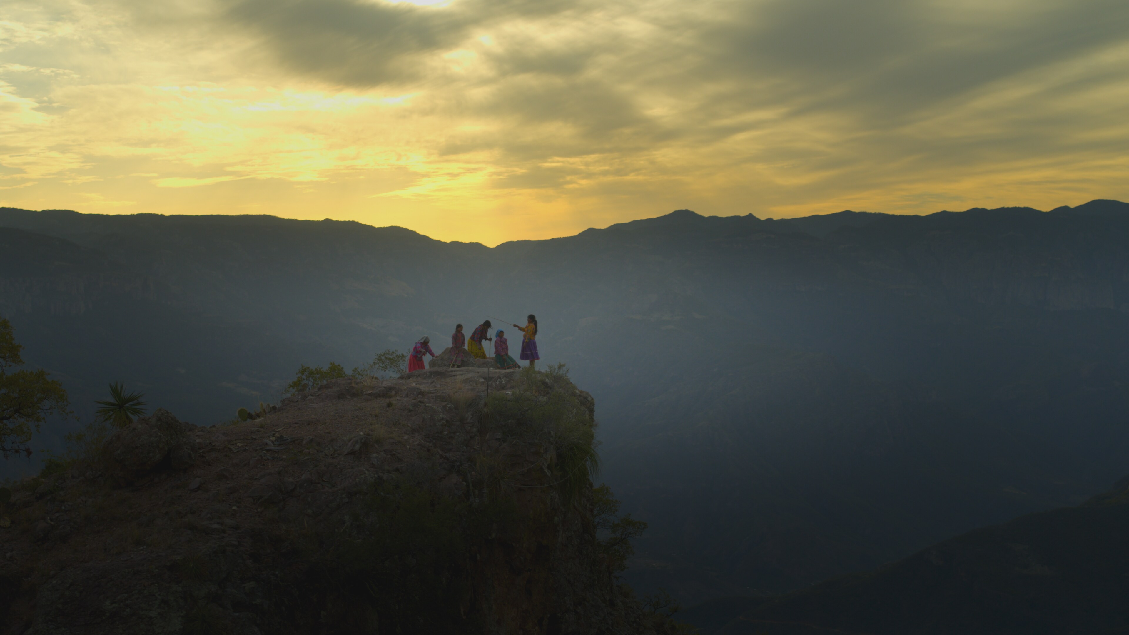 An aerial view of Raramuri women on a mountain. (National Geographic for Disney+)
