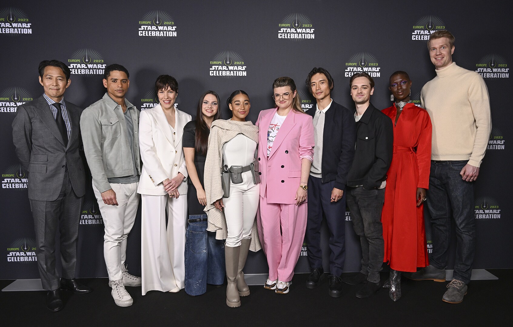 The cast of The Acolyte join creator and showrunner Leslye Headland at Star Wars Celebration.  