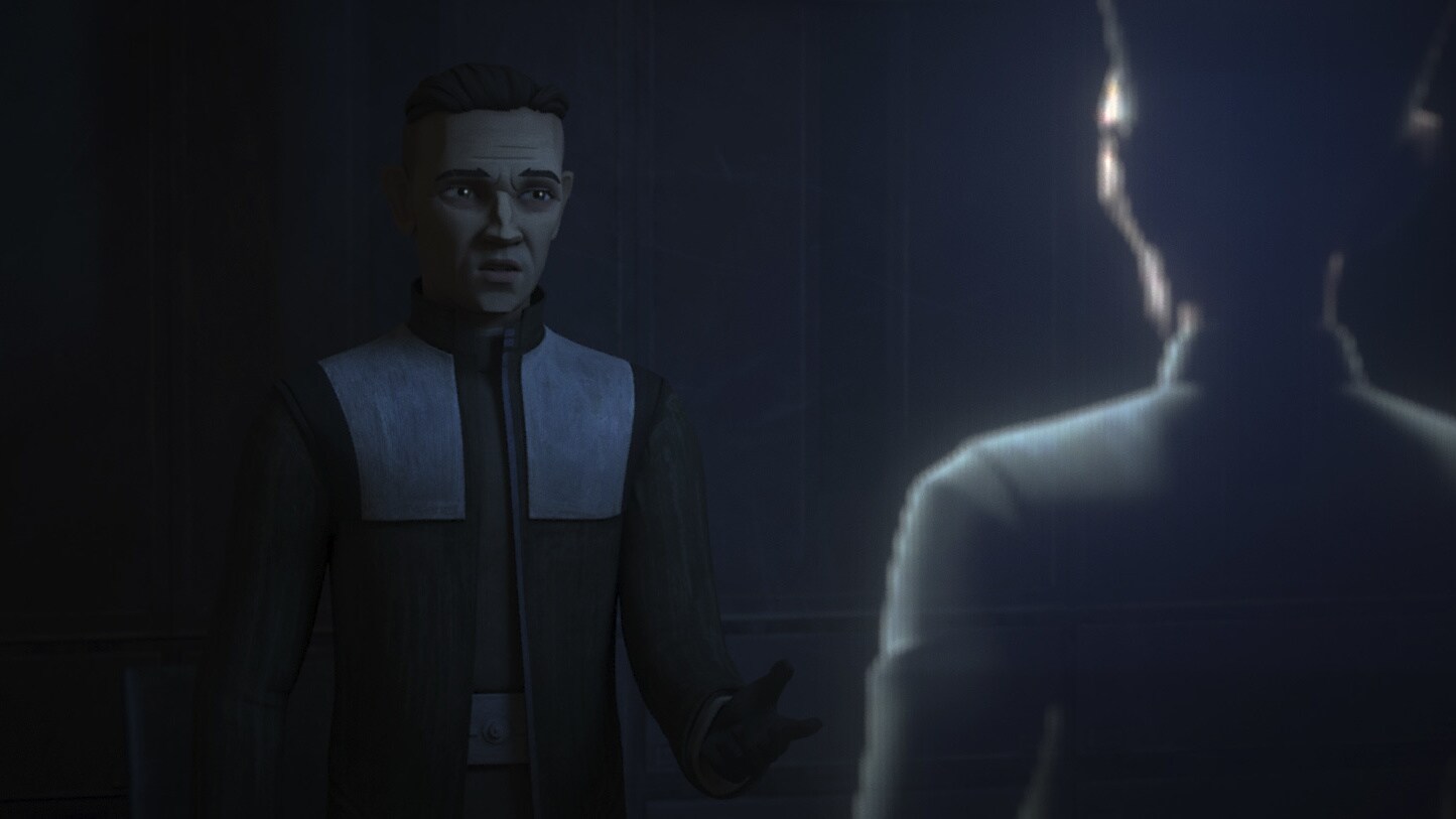 Back on Wayland, Doctor Hemlock speaks with Governor Tarkin via holo. The stolen data from the at...