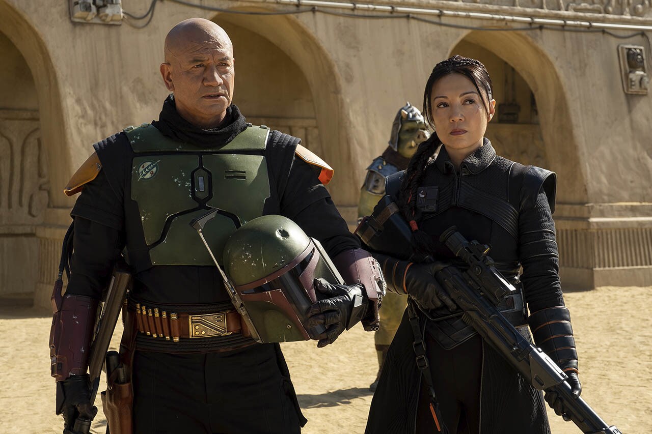 (L-R): Boba Fett (Temuera Morrison) and Fennec Shand (Ming-Na Wen) in Lucasfilm's THE BOOK OF BOBA FETT