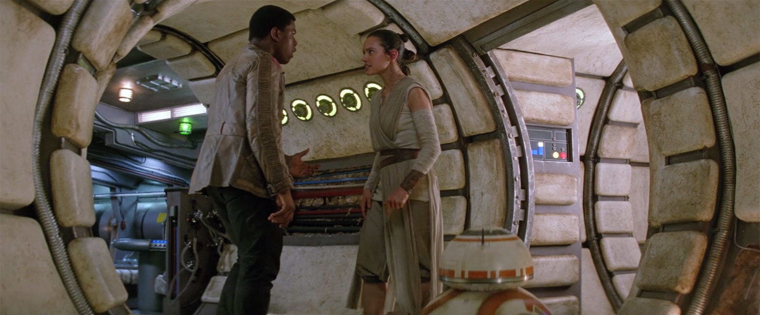 Finally safe, Finn and Rey are exuberant. They introduce themselves by name, but again, there’s n...