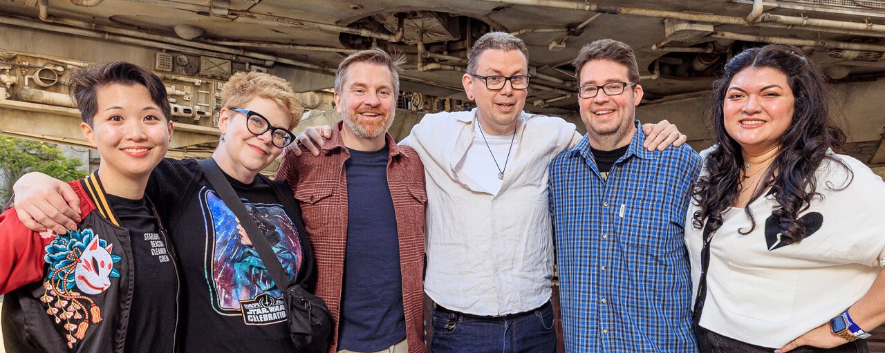The Authors of The High Republic in front of the Millenium Falcon.