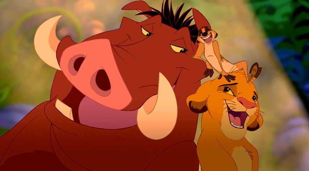 Simba, Timon and Pumbaa singing “Hakuna Matata" in the animated movie "The Lion King"