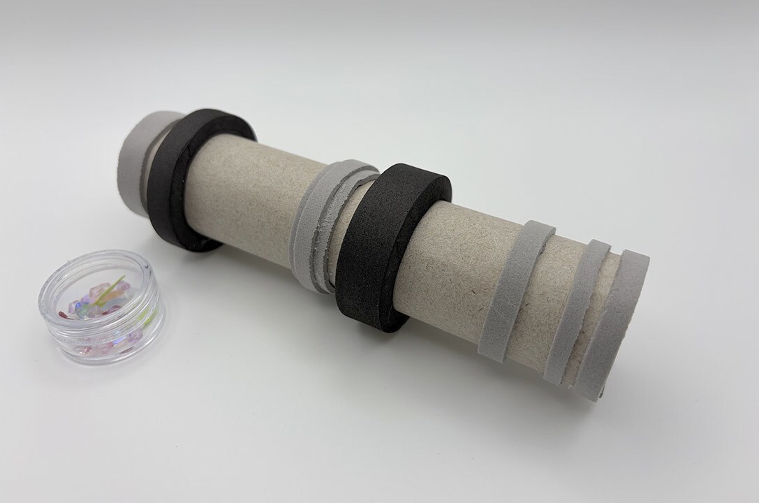 The strips in place around the tube.