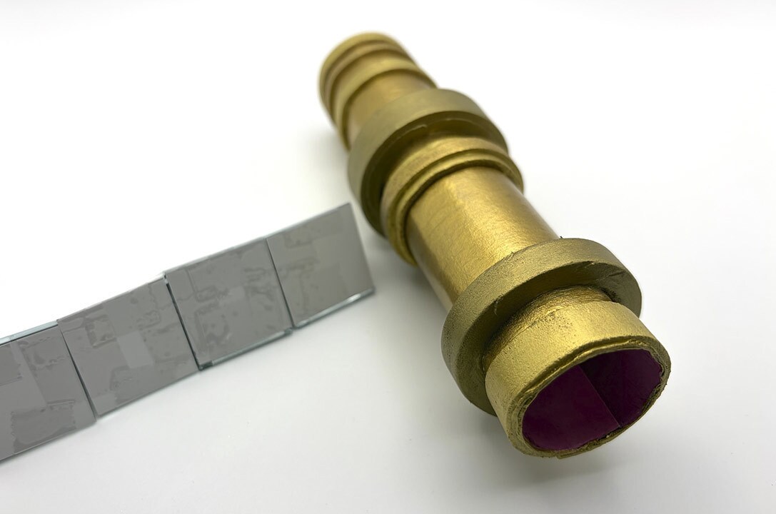 The five triangles together into one long piece.