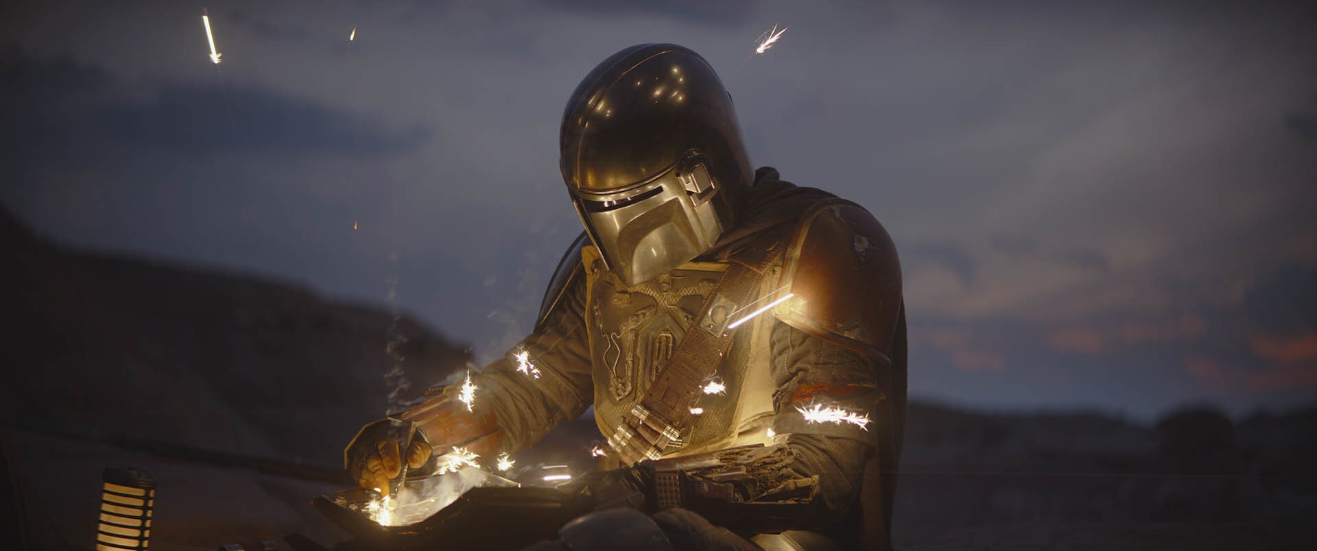 Night falls. The Mandalorian sets up camp, then tends to his wounds and battle-worn armor. Repeat...