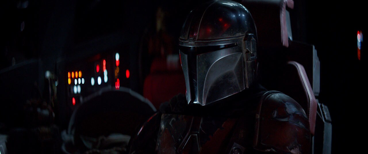 In space, the Mandalorian monitors the sleeping child, exhausted from its efforts.