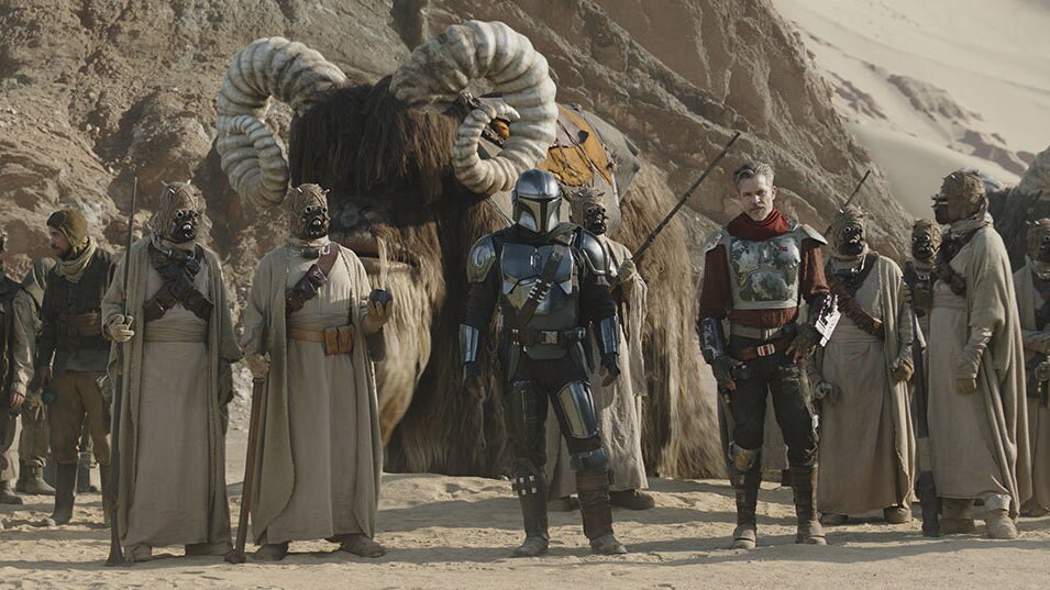 The Mandalorian volunteers Vanth's village as reinforcements. The townspeople initially bristle a...