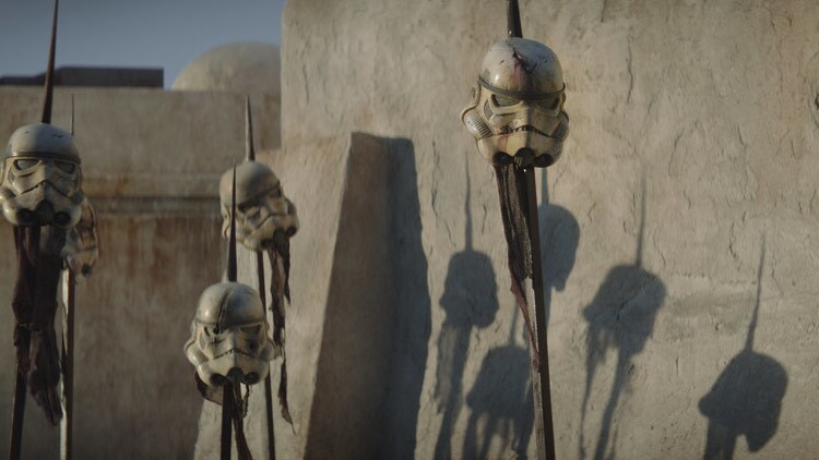 Stormtrooper helmets on pikes in The Mandalorian
