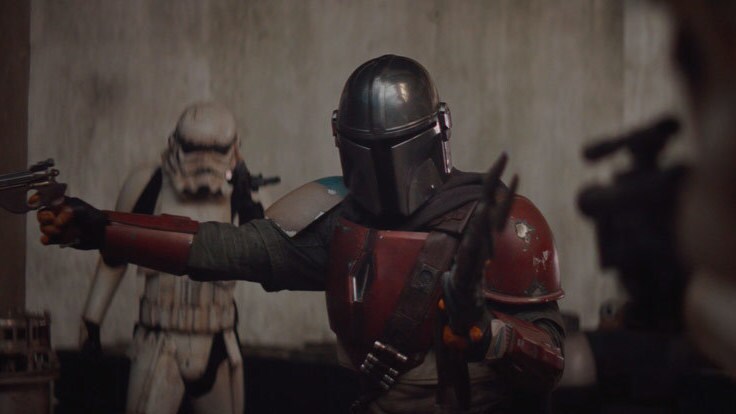 The Mandalorian stands off with stormtroopers