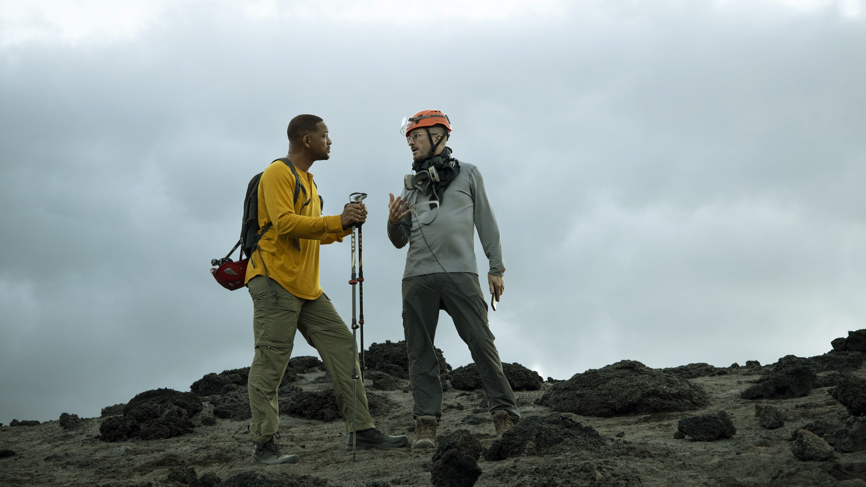Will Smith, left, and Executive Producer Darren Aronofsky during production of Welcome to Earth where Will descends into a volcano to install sensors. (National Geographic for Disney+/Kyle Christy)