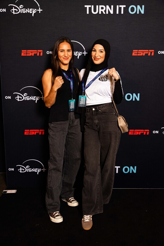 Tina Rahimi & Guest at the ESPN on Disney+ launch event in Sydney, Australia.