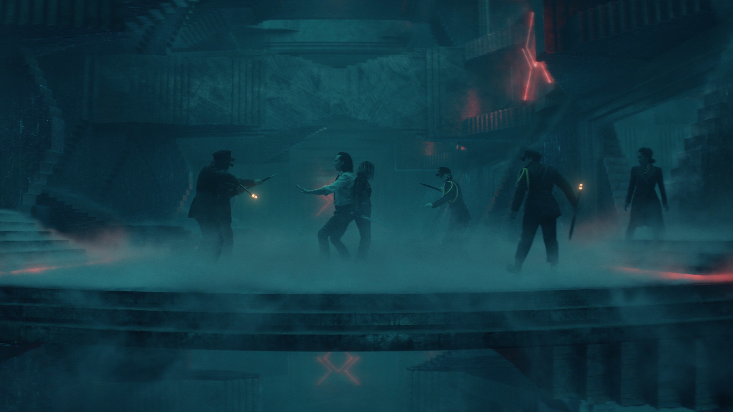 (Center l-r): Loki (Tom Hiddleston), Sylvie (Sophia Di Martino) and (far right): Judge Renslayer (Gugu Mbatha-Raw) in Marvel Studios' LOKI, exclusively on Disney+. Photo courtesy of Marvel Studios. ©Marvel Studios 2021. All Rights Reserved.