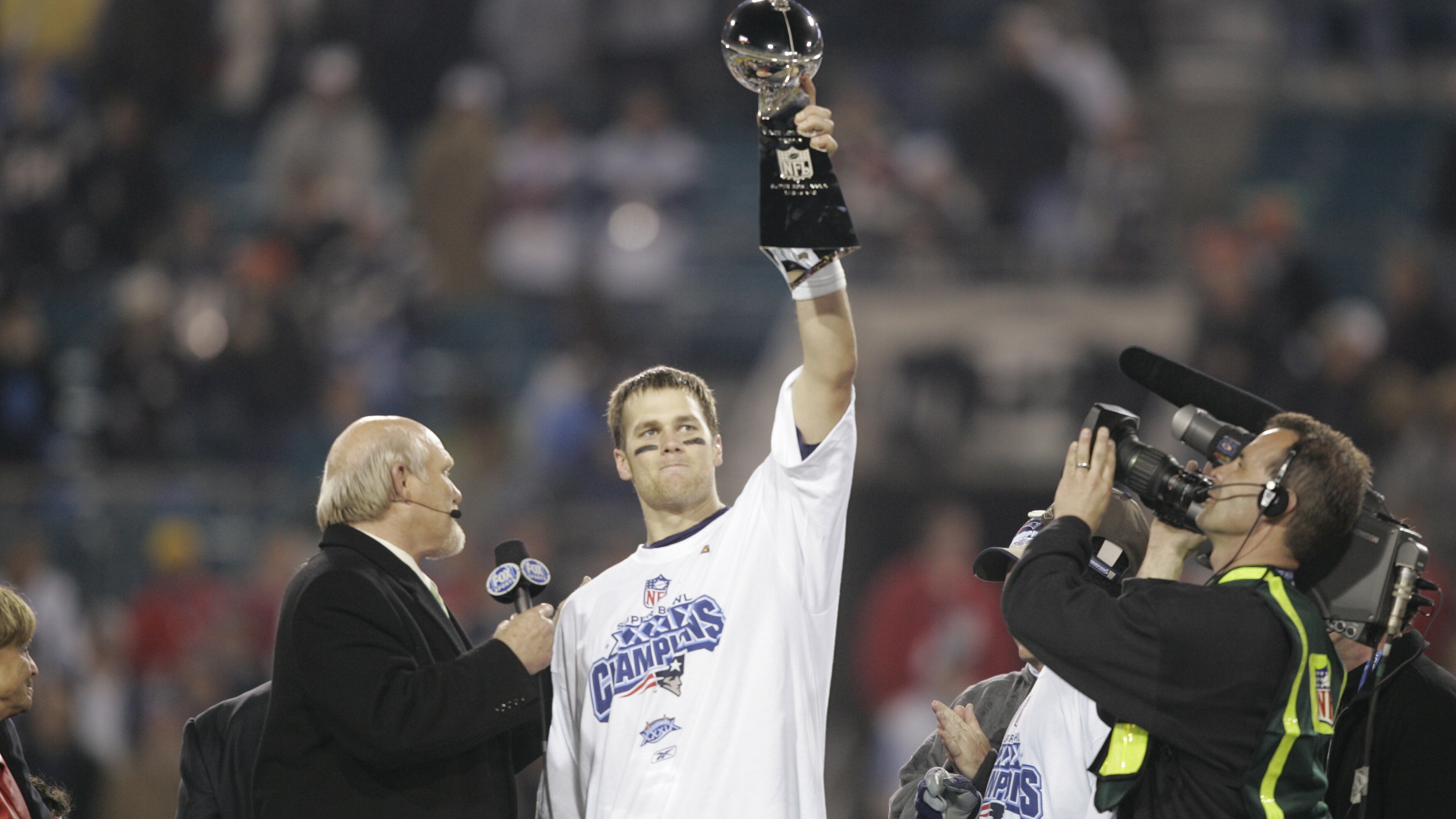 JACKSONVILLE, FL - FEBRUARY 6, 2005: Tom Brady of the New England Patriots holds up the Lombardi Trophy after winning Super Bowl XXXIX at ALLTEL Stadium (Photo by Scott Clarke / ESPN Images)
