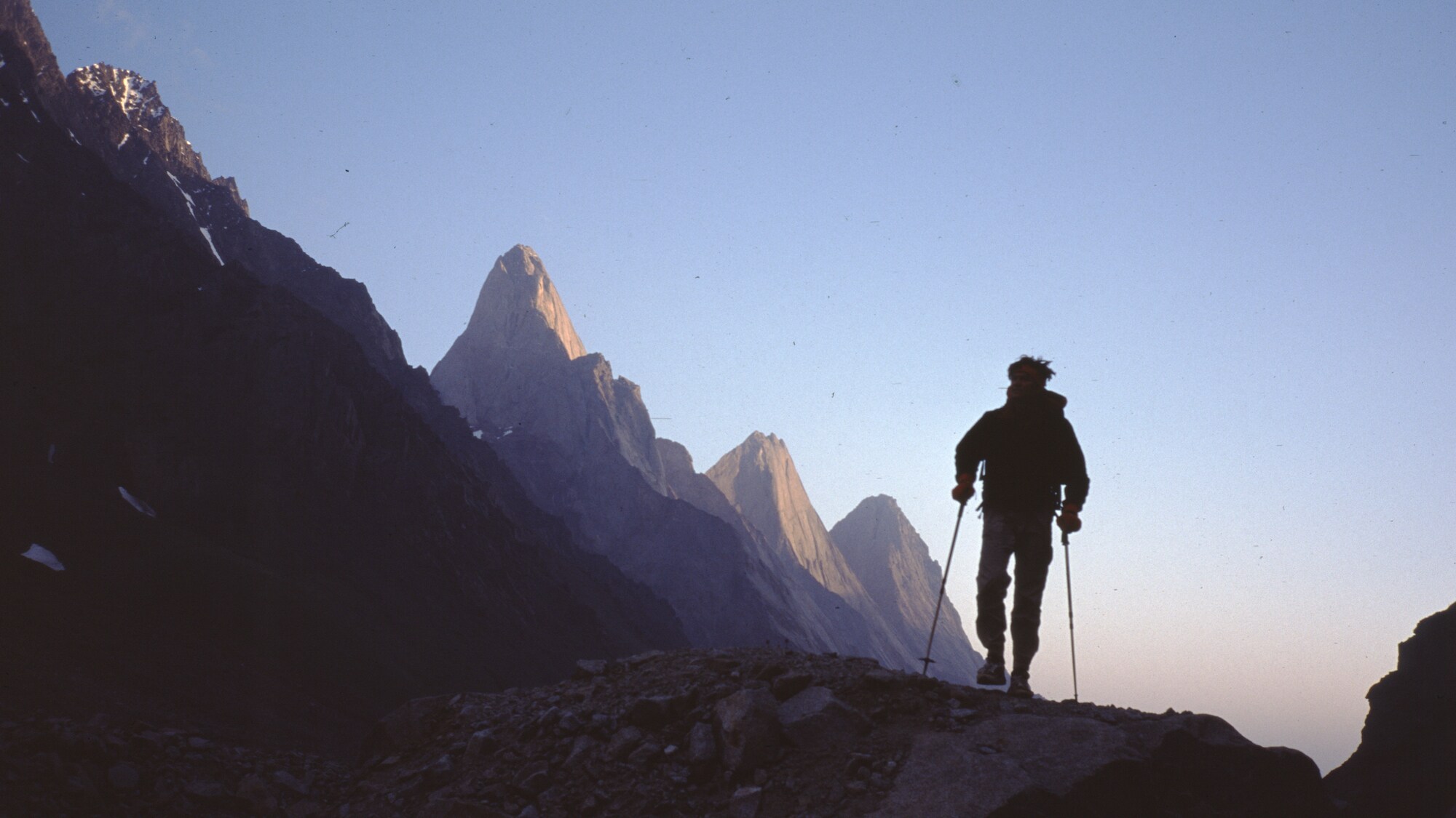 Alex Lowe with Peak 4810 in the background, Ak Su Krgyzstan 1995. (Credit: Conrad Anker)