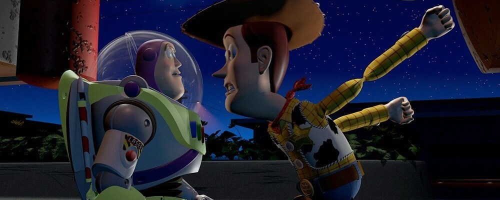 Woody lighting a firecracker that is taped to Buzz Lightyear's back in the movie "Toy Story"