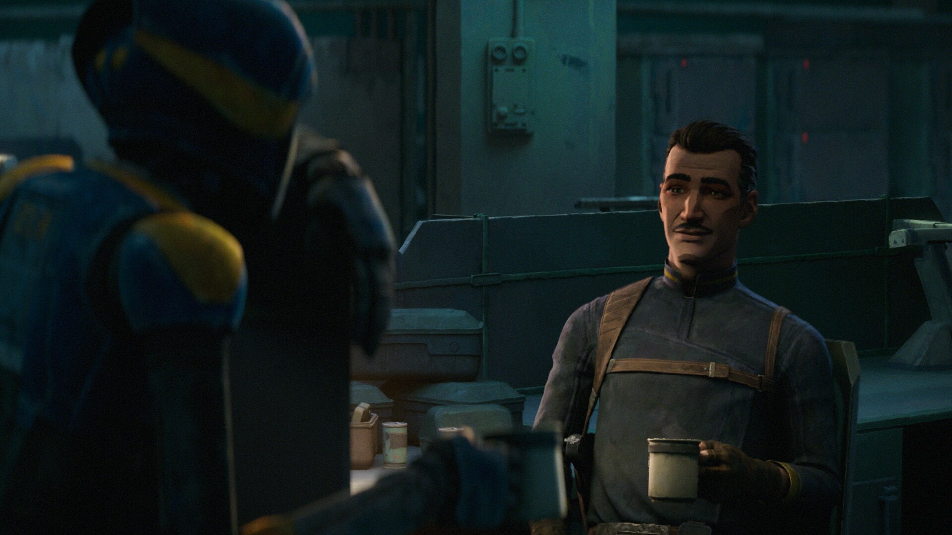 Captain Brander Lawson holding a cup of caf in his hand.