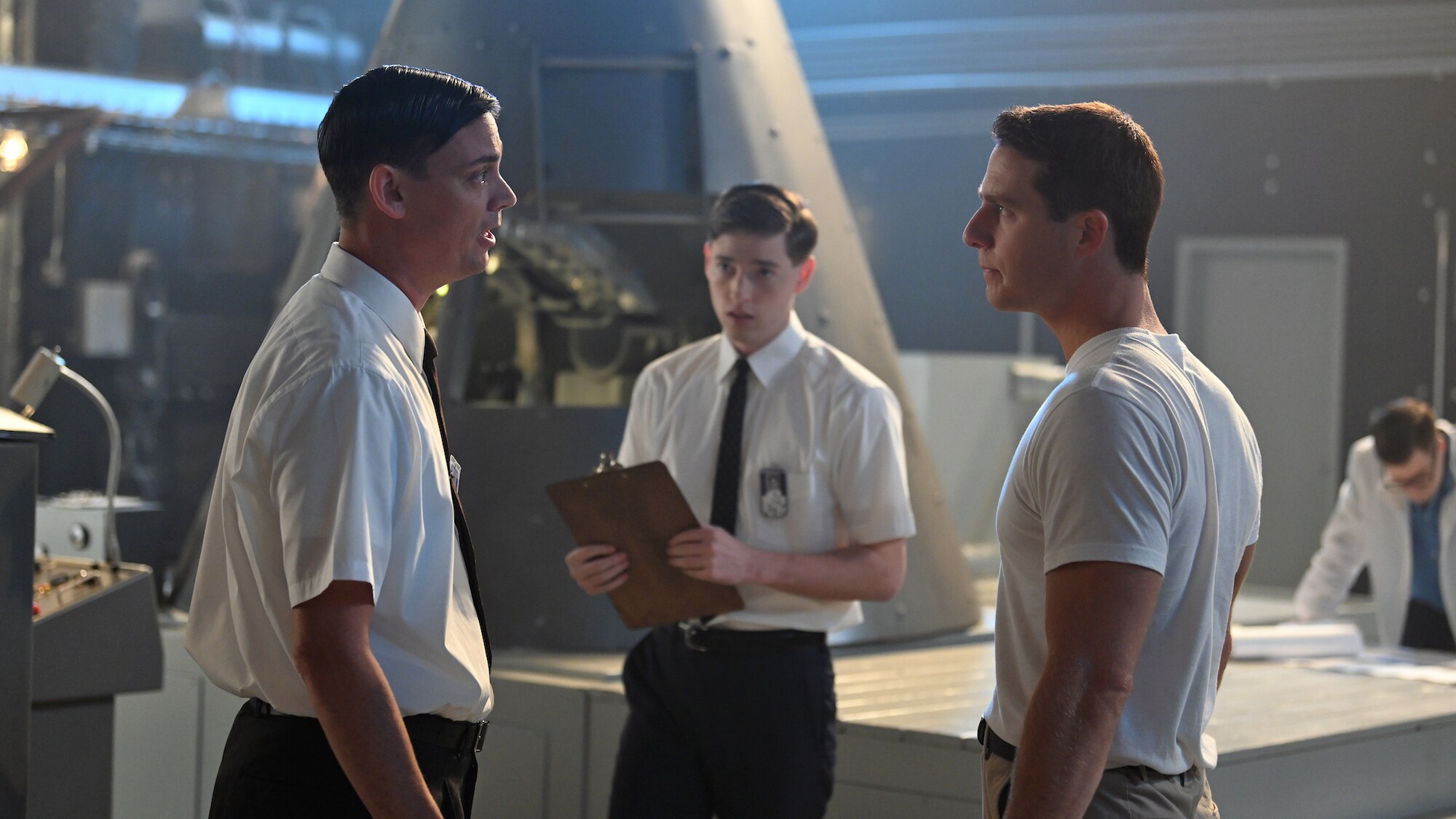 L to R: Joshua Ritter as Roy Hutmacher, Jackson Pace as Glynn Lunney and Jake McDorman as Alan Shepard during a training session in National Geographic's THE RIGHT STUFF streaming on Disney+. (Credit: National Geographic/Gene Page)