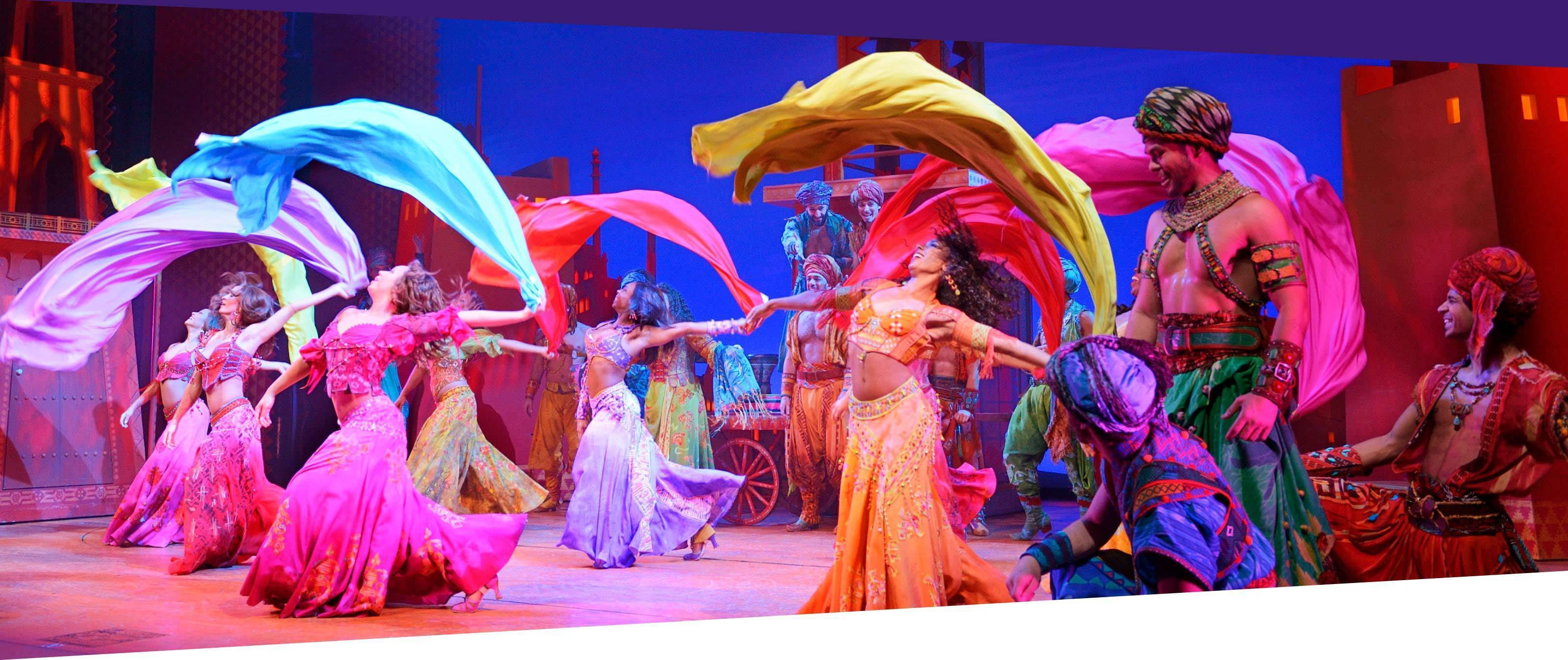 The Aladdin ensemble on stage