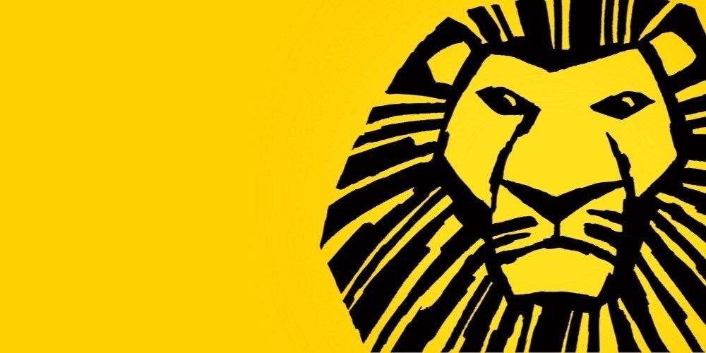 黑色轮廓狮子的黄色背景上绘制