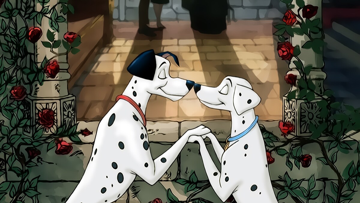 Pongo and Perdita holding paws and touching noses together