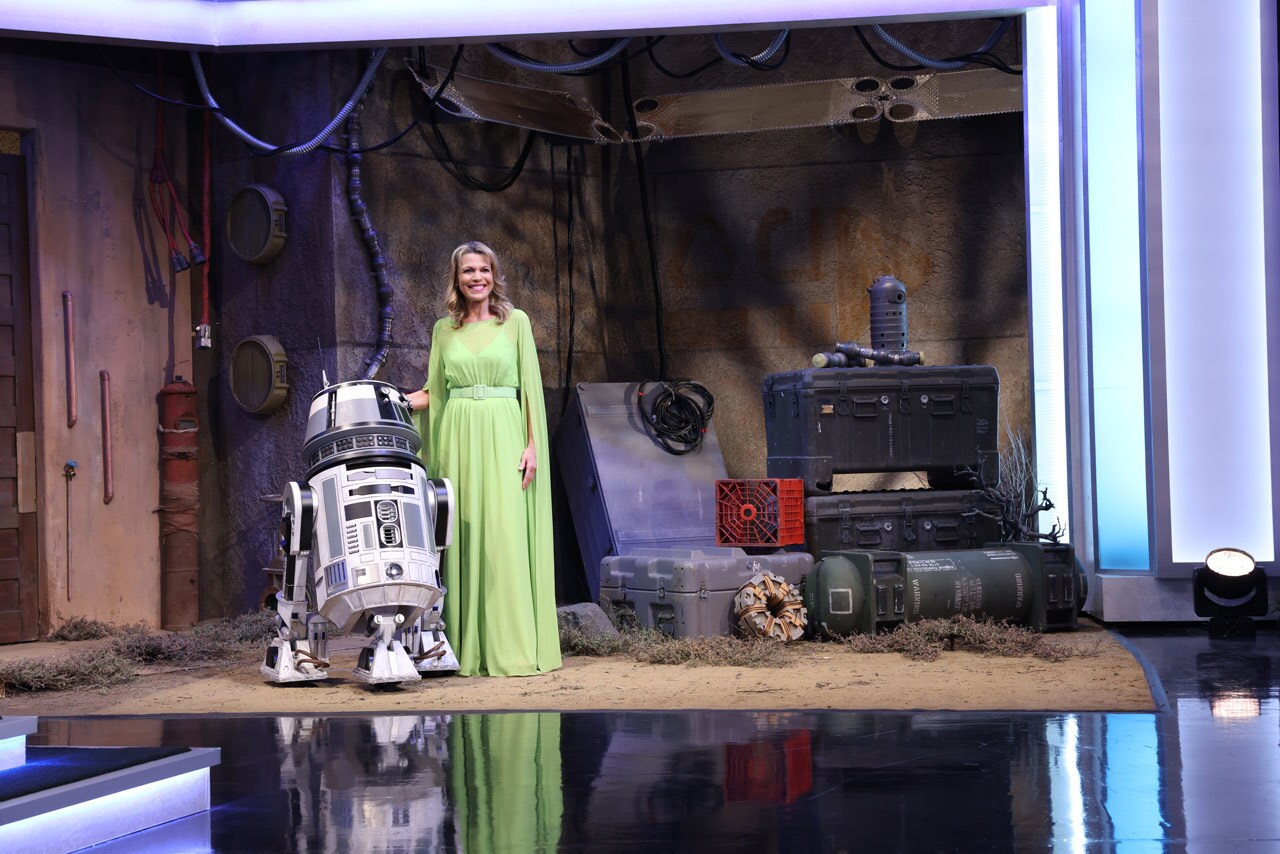 Vanna White with droid during Galactic Celebration on Wheel of Fortune