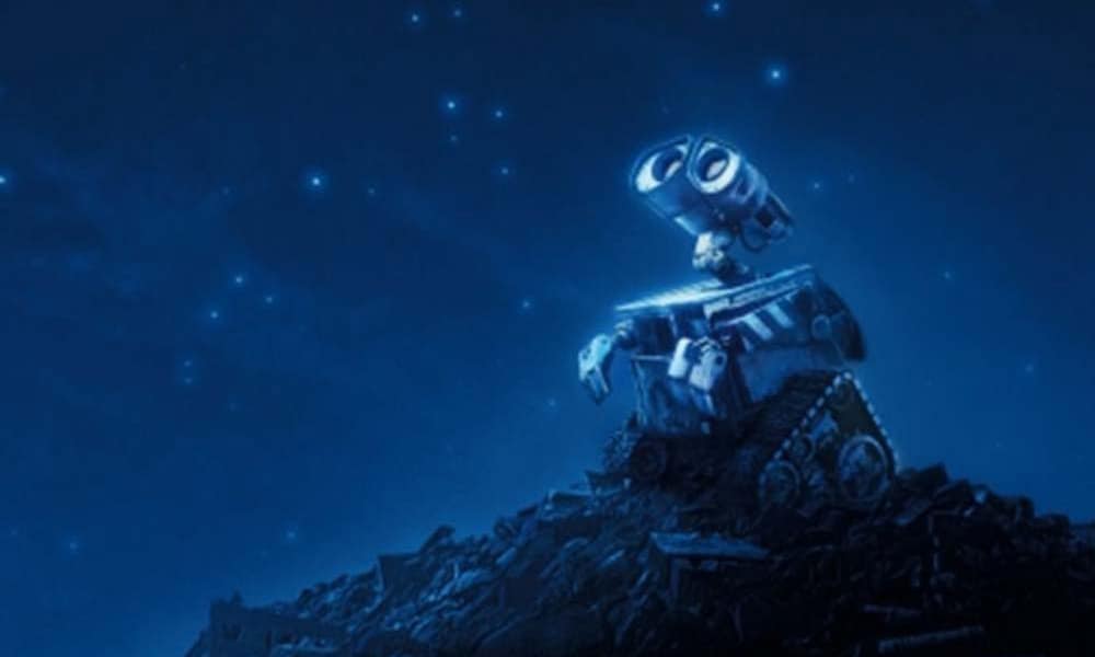 The robot from the animated movie "Wall-E" looking up at stars