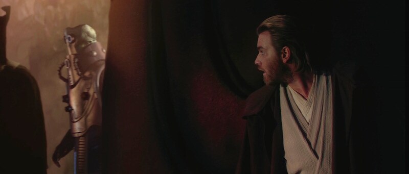 Wat Tambor walking past an eavesdropping Obi-Wan Kenobi