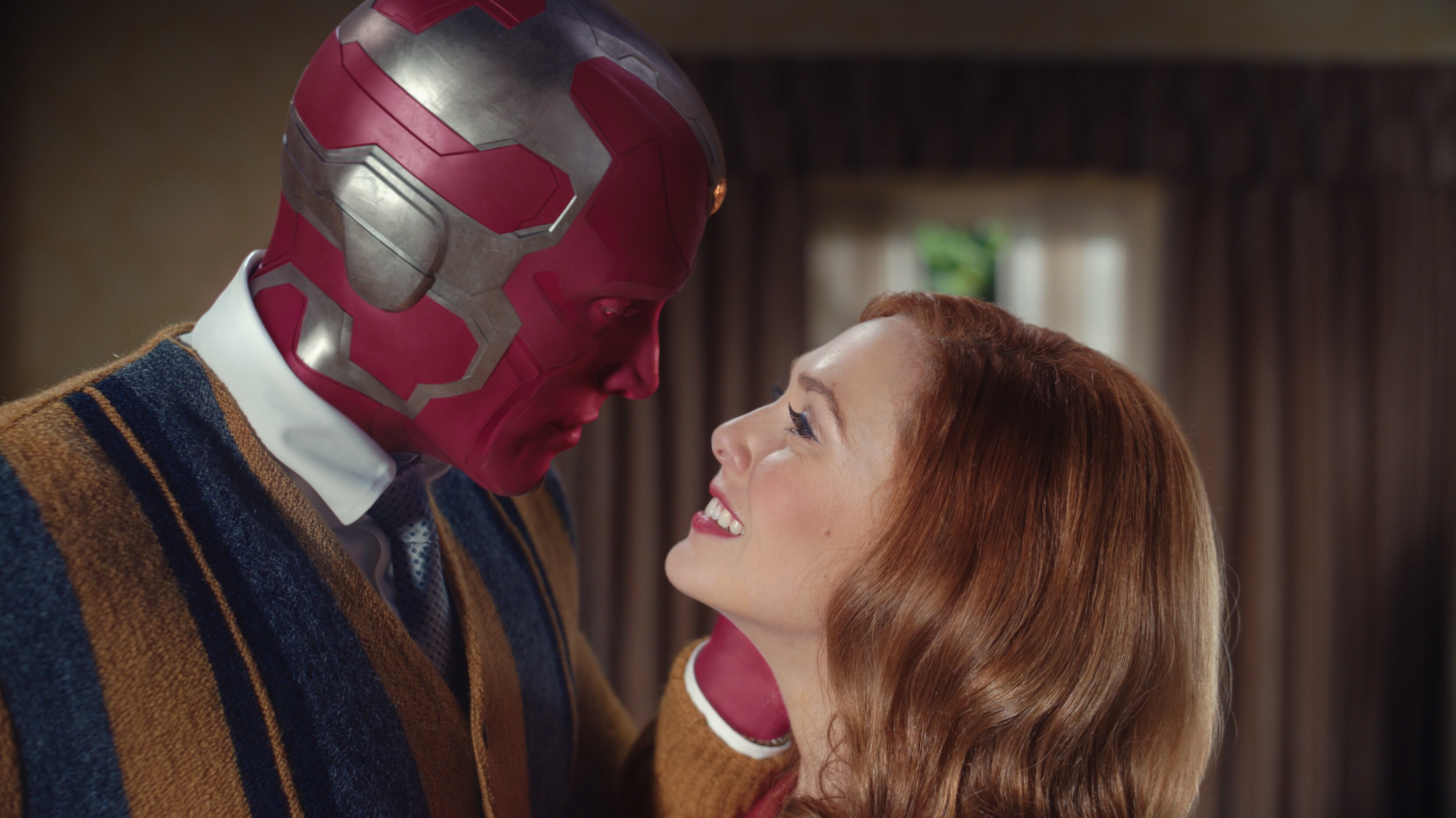 (L -R): Paul Bettany as VIsion and Elizabeth Olsen as Wanda Maximoff in Marvel Studios' WANDAVISION exclusively on Disney+. Photo courtesy of Marvel Studios. ©Marvel Studios 2020. All Rights Reserved.