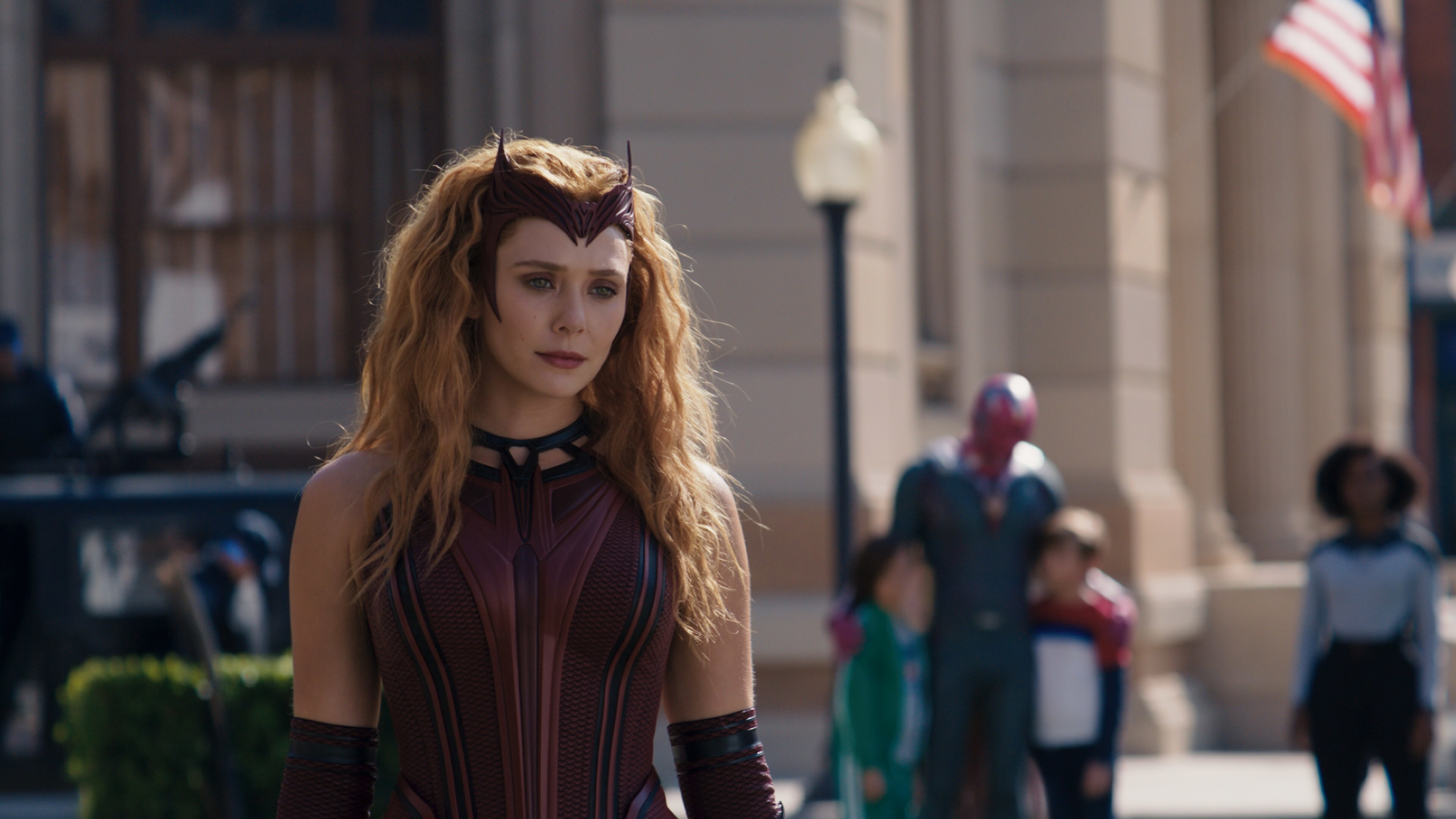 L-R): Scarlet Witch/Wanda Maximoff (Elizabeth Olsen), Tommy (Jett Klyne), Vision (Paul Bettany), Billy (Julian Hilliard) and Monica Rambeau (Teyonah Parris) in Marvel Studios' WANDAVISION exclusively on Disney+. Photo courtesy of Marvel Studios. ©Marvel Studios 2021. All Rights Reserved.