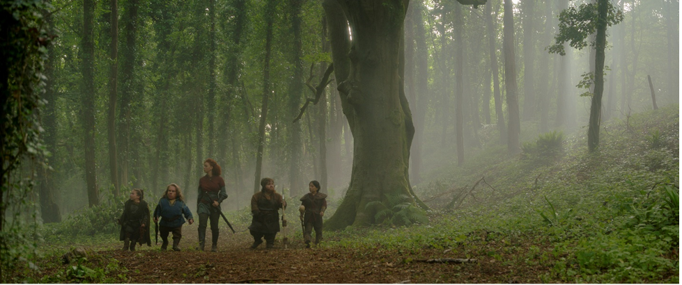 5 people walk through the forest in the Disney+ Original series Willow