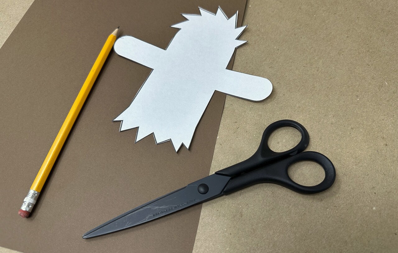 Step 2: Next, trace the Wookiee shape on the brown cardstock paper. Cut it out with scissors.
