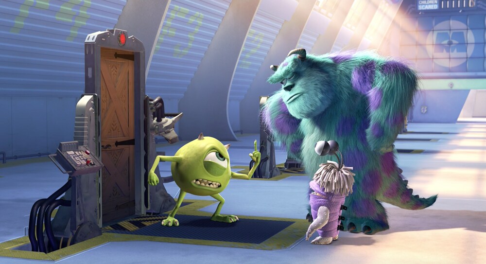 Mike, Sulley, and Boo next to a door in the animated movie "Monsters, Inc."