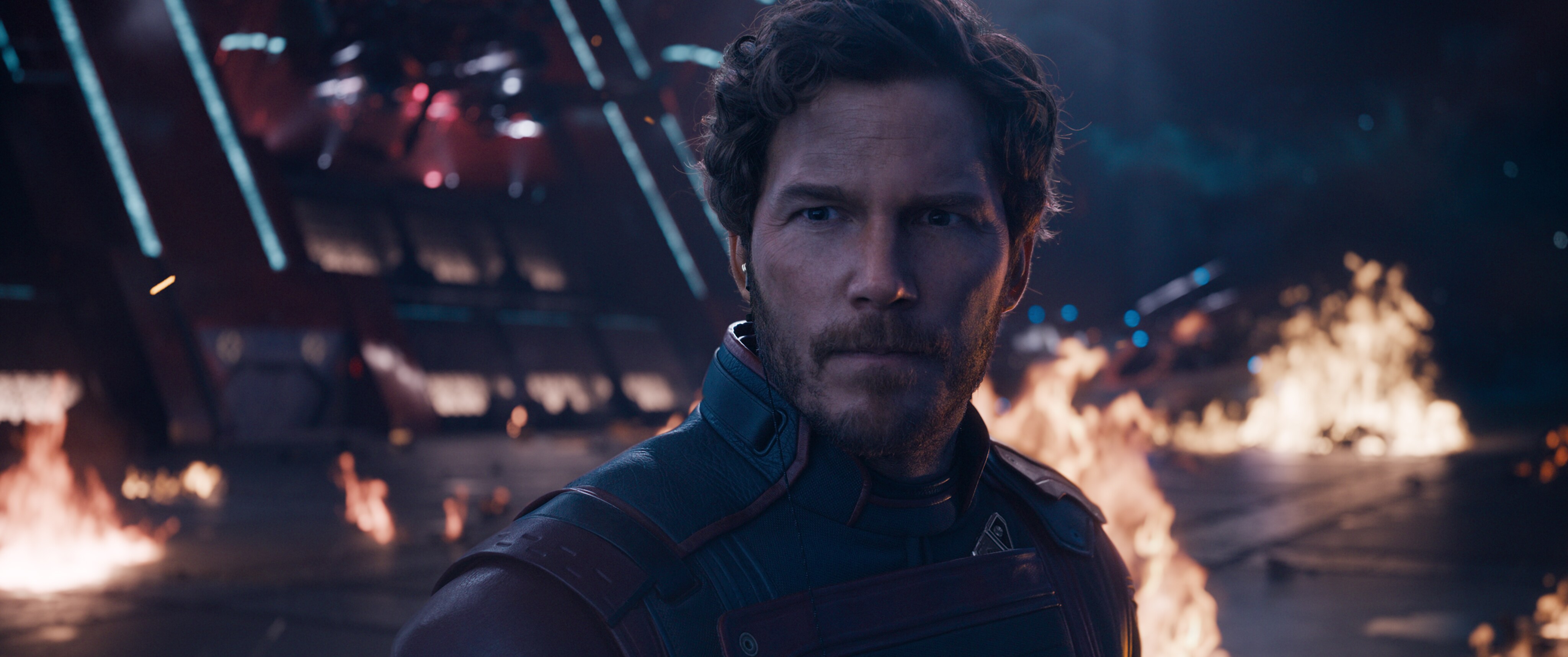 Peter Quill (Chris Pratt) faces forward