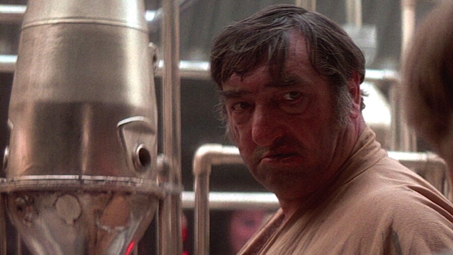 Wuher behind the bar in the Mos Eisley Cantina