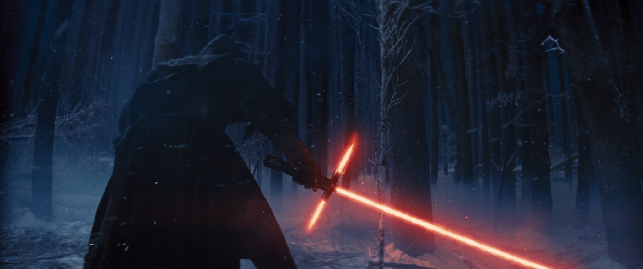 Adam Driver as Kylo Ren ignites his red lightsaber. From the movie, "Star Wars: The Force Awakens."